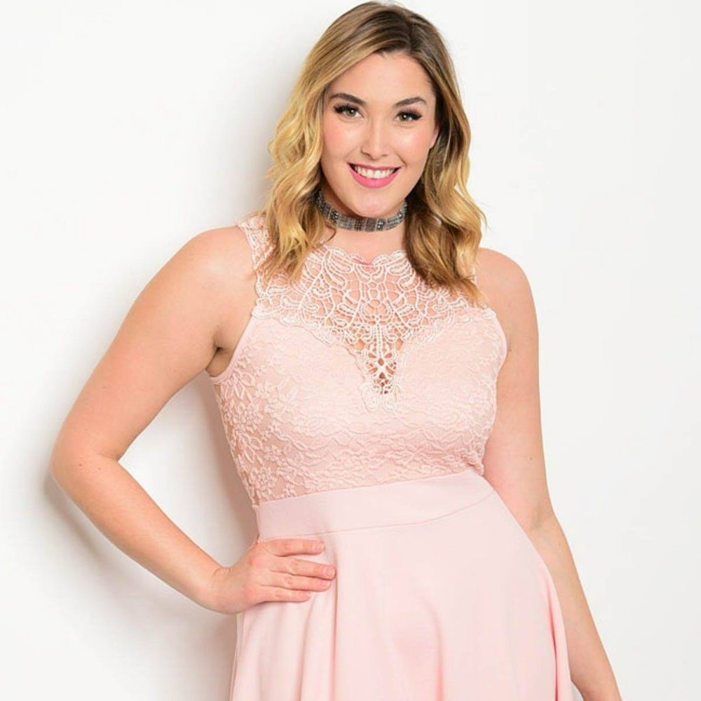 Pink plus size sleeveless lace detail skater dress.